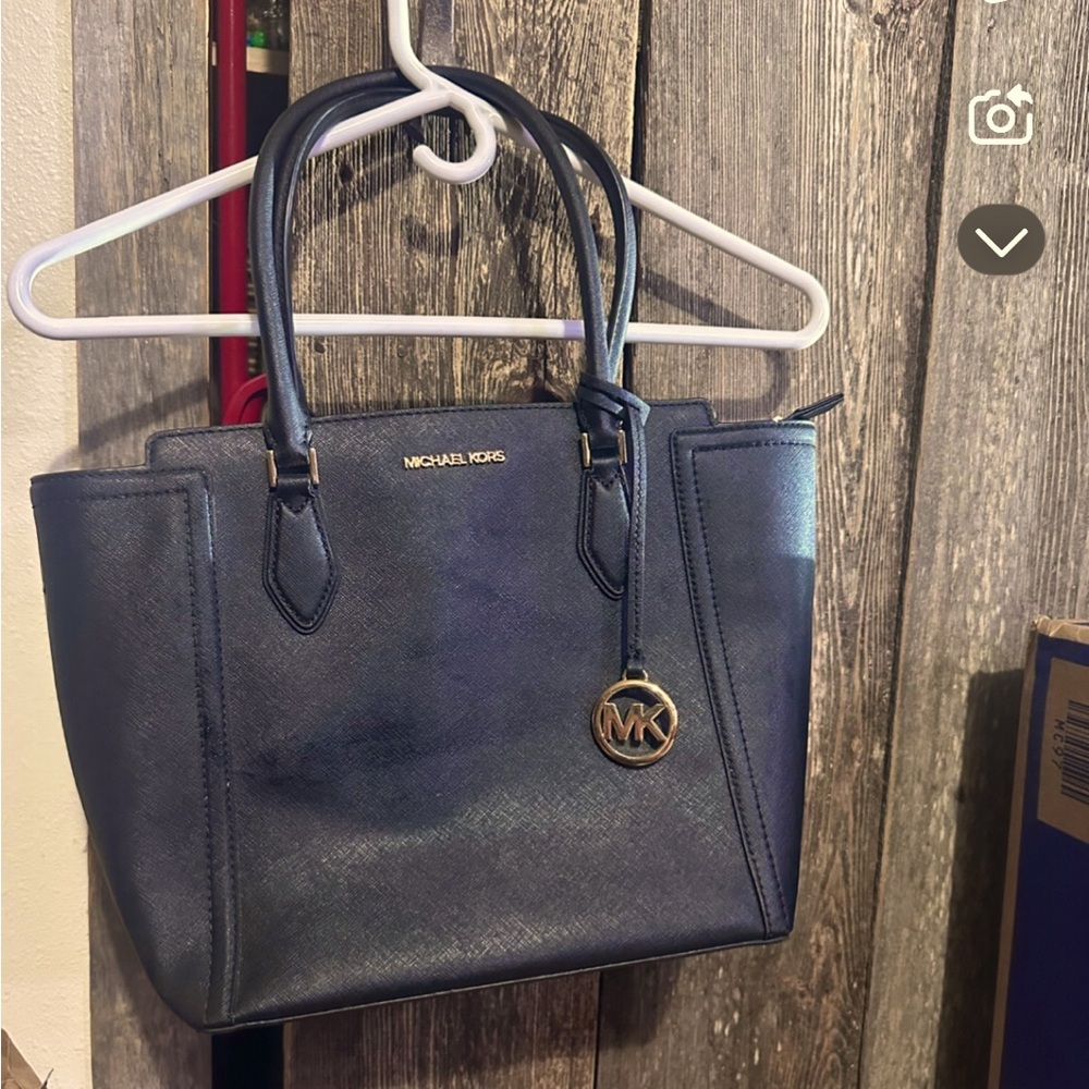 Michael Kors black tote bag.